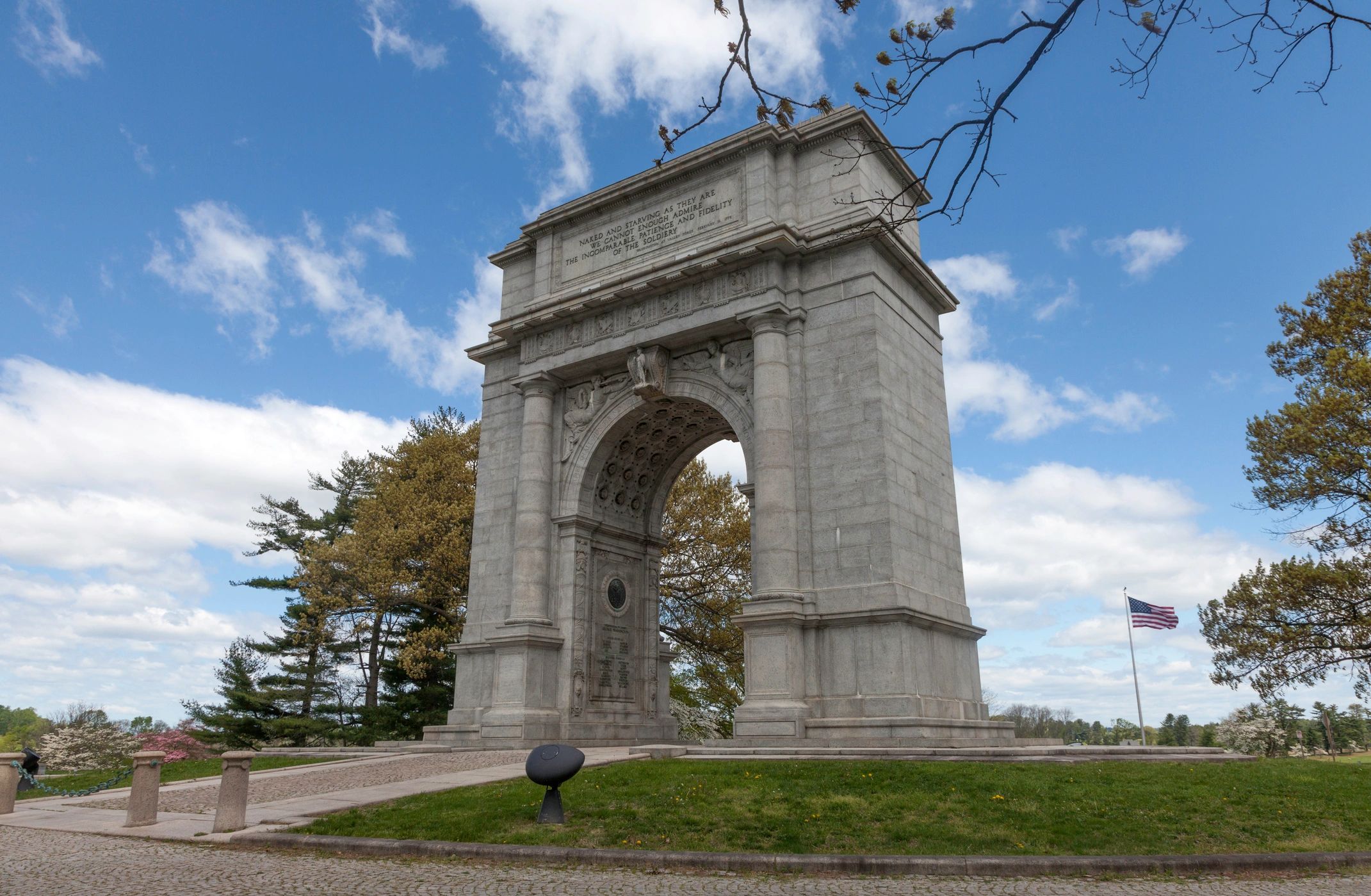 Historic stone arch at Valley Forge in autumn